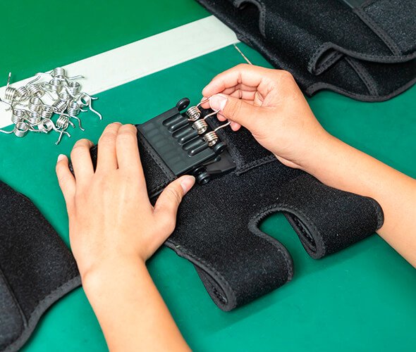 a worker assembling a keen support