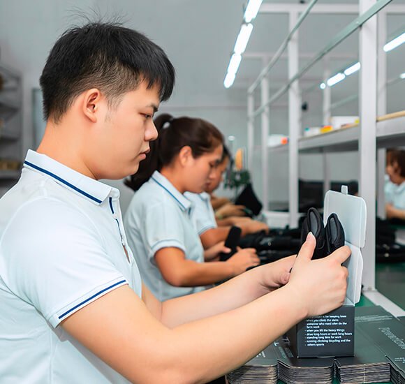 a factory with workers working on a assembly line