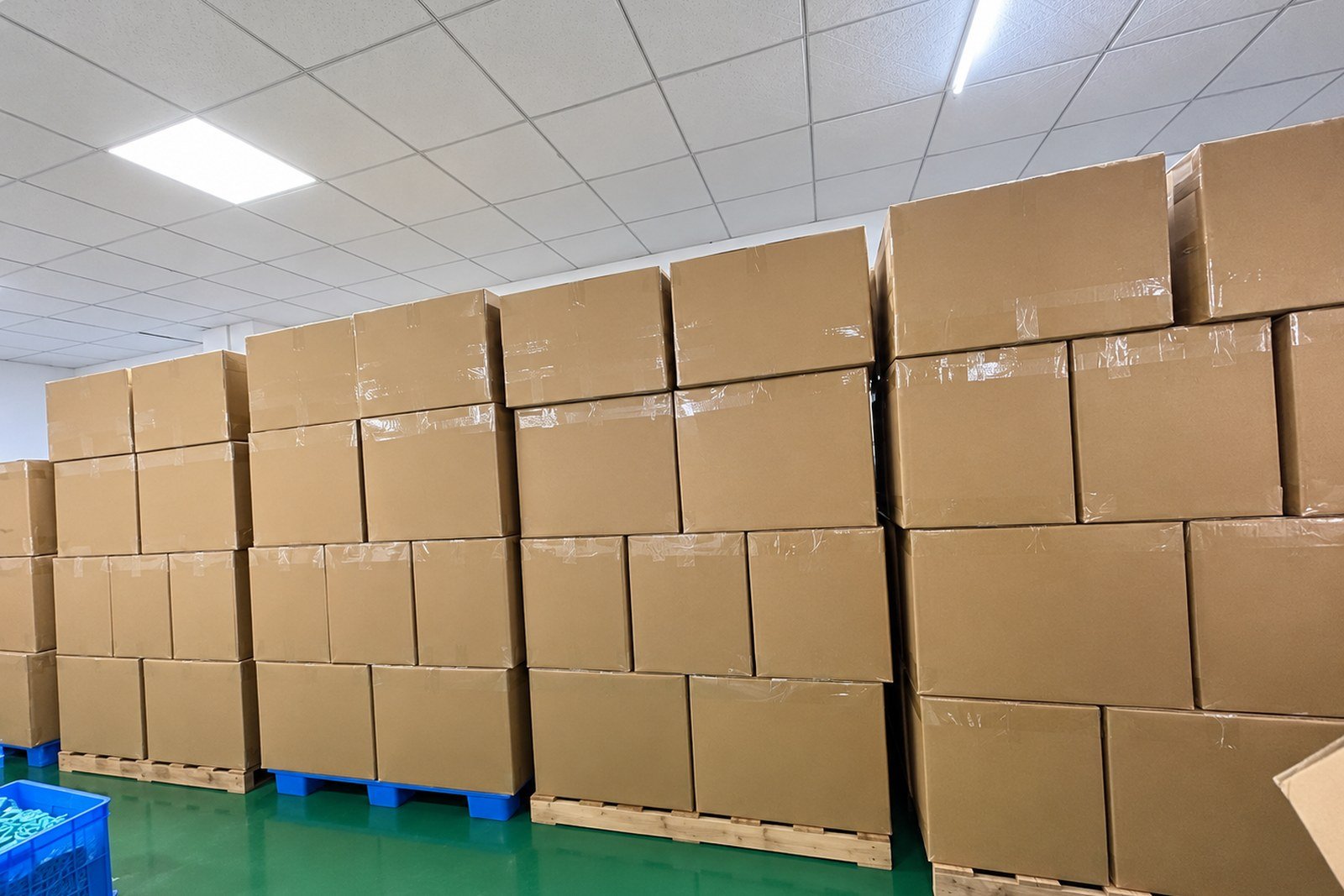 Labelled cartons stacked on warehouse shelving in Shenzhen