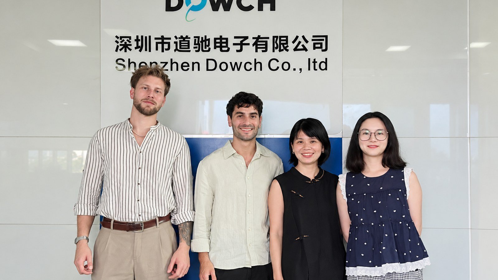Dowch team with international clients at the Shenzhen office